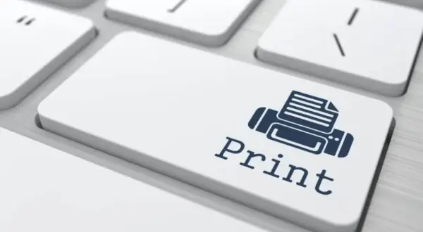 Klawisz "Print" z ikoną drukarki. Pytanie, czy można drukować bez kolorowego tuszu, jest tu kluczowe.