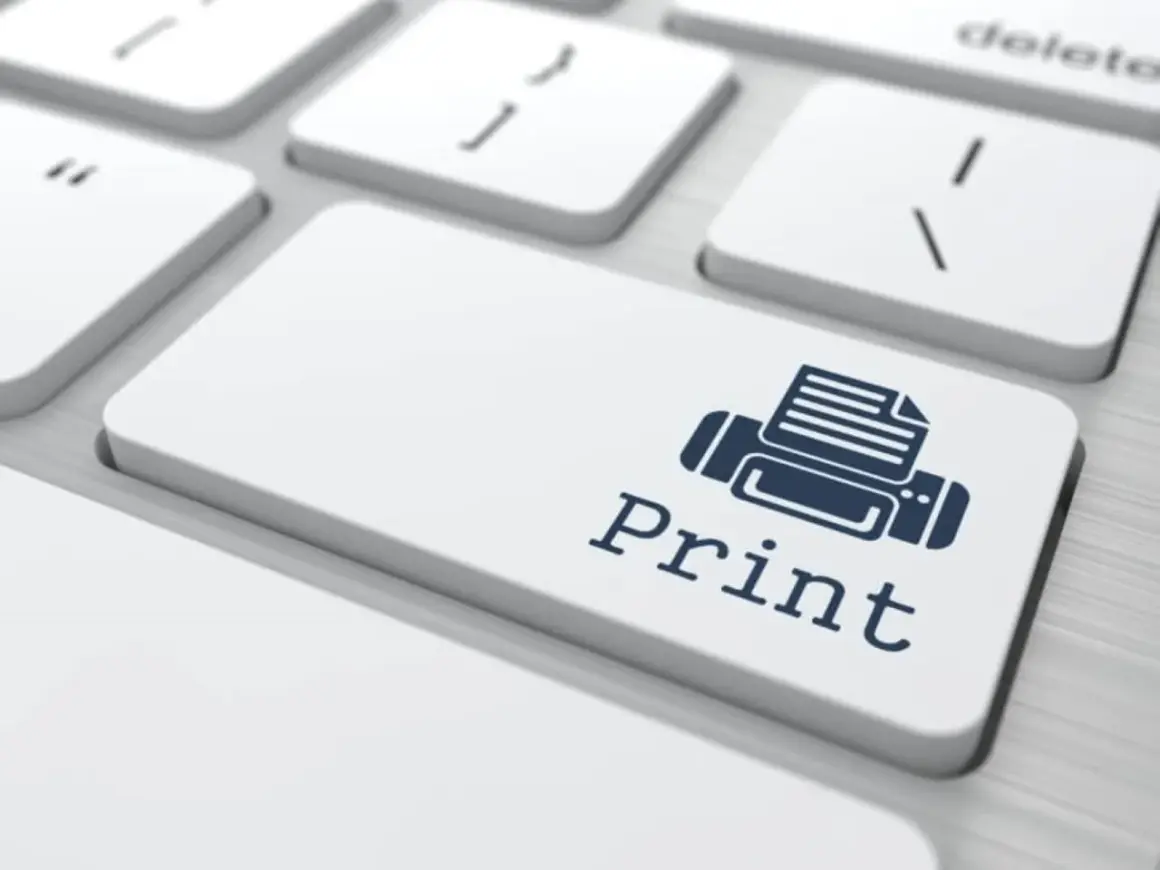 Klawisz "Print" z ikoną drukarki. Pytanie, czy można drukować bez kolorowego tuszu, jest tu kluczowe.